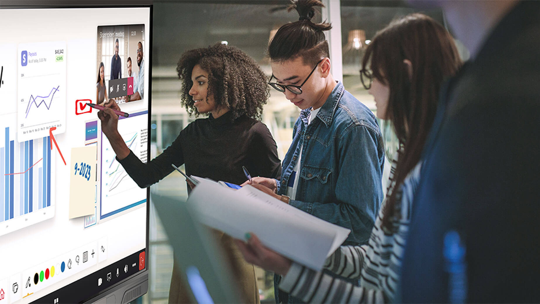 A collaborative environment using a SMART interactive display in a higher education setting.